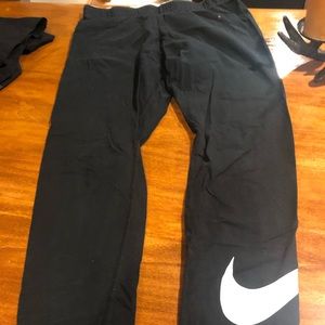 Nike leggings with swosh on the bottom leg